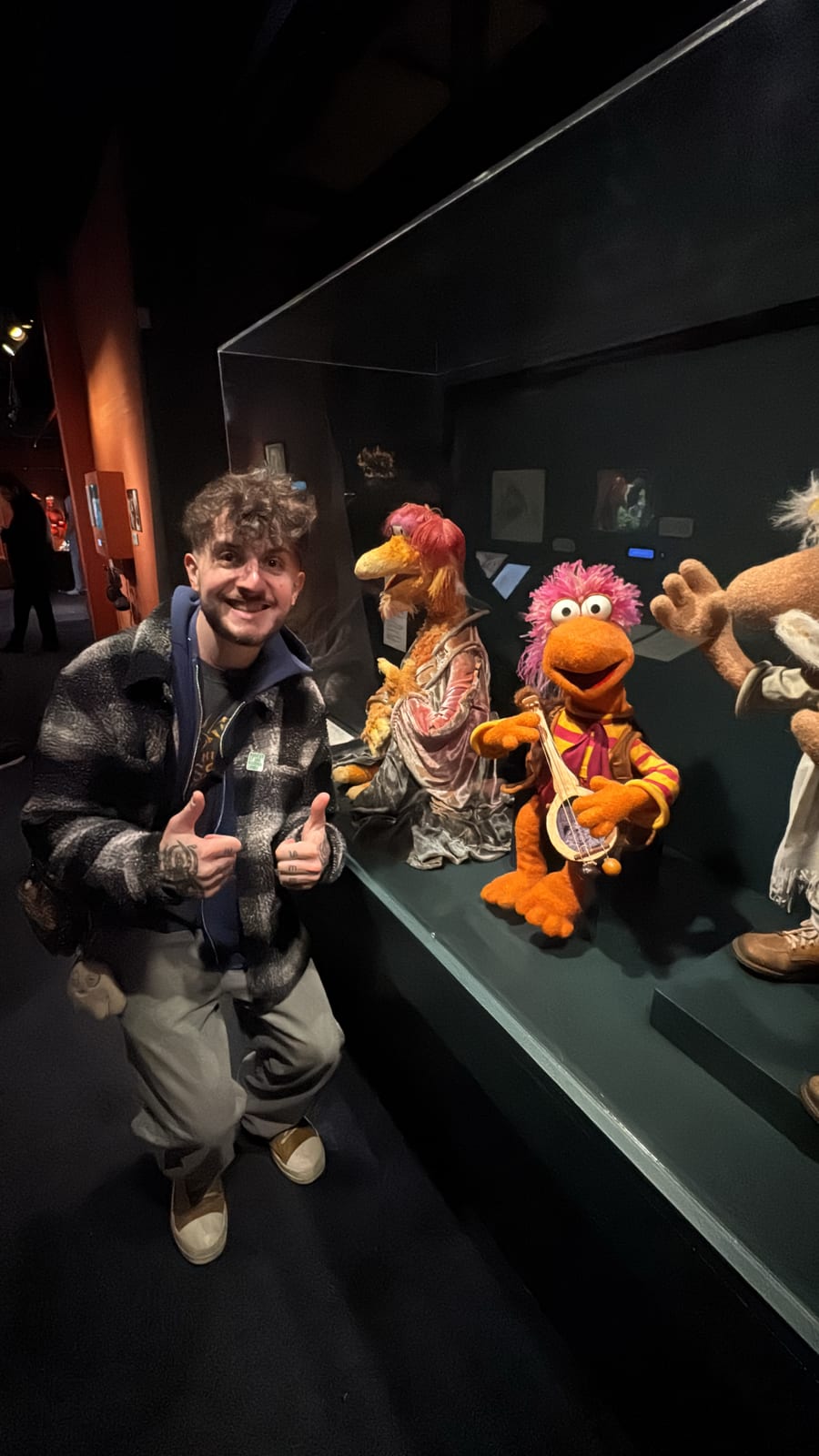 Andres visiting a Muppets exhibit